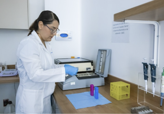 ABC laboratory specialist analyzes tests in a molecular pathology setting with advanced technology and genetic analysis.